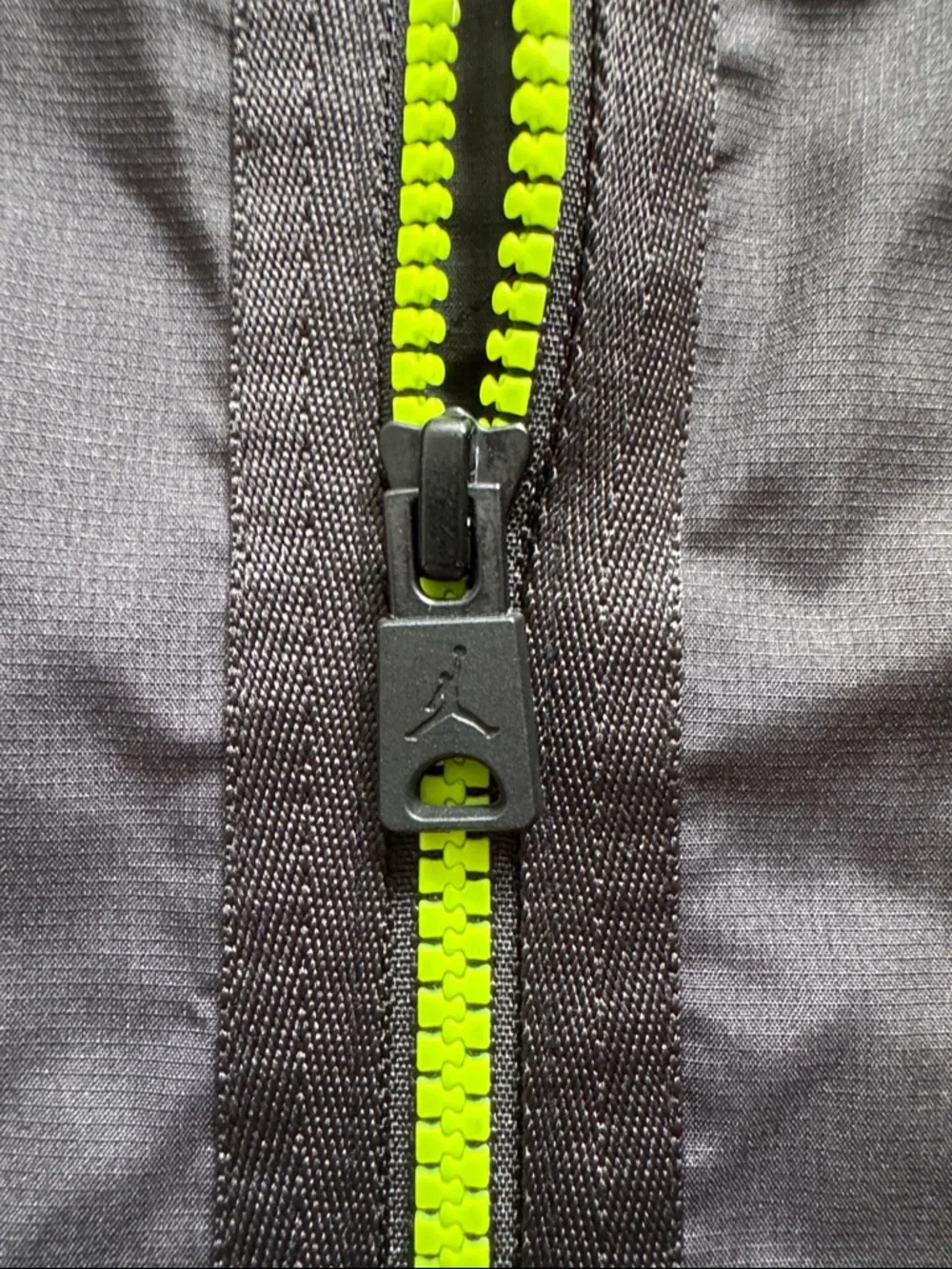 Air Jordan Black, hooded Windbreaker Jacket with Neon Zip. Youth Size XL